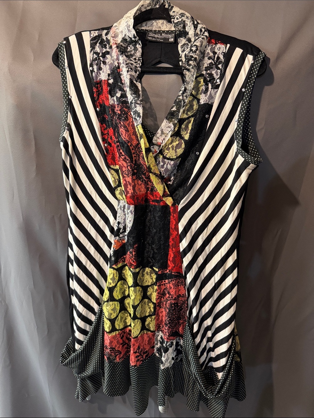Sleeveless Mixed-Print Tunic in Black & White with Red and Olive Accents